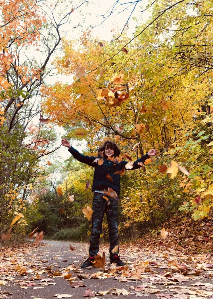 Fall Activities - Fall Walk - boy with leaves