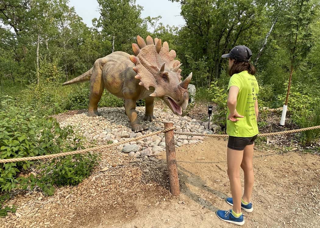 Winnipeg-Assiniboine-Zoo-girl-in-dino-park