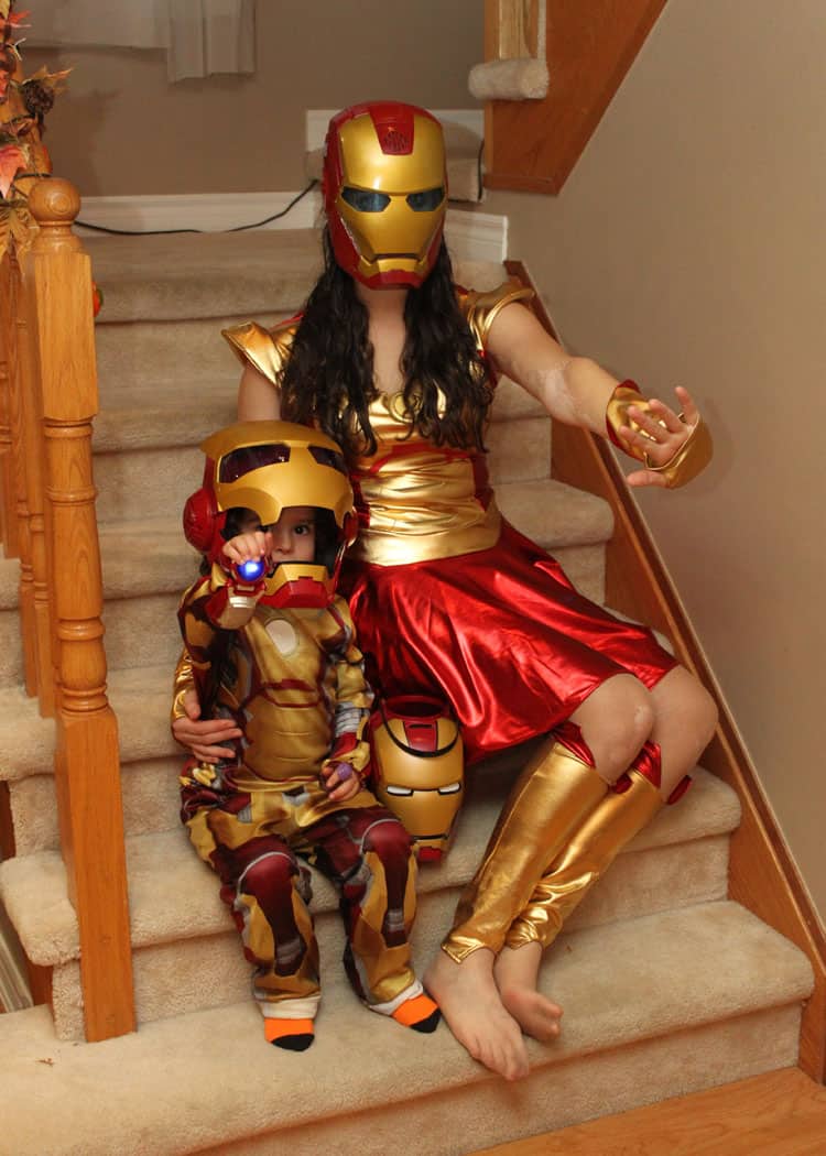 little boy and teen girl dressed as Iron Man