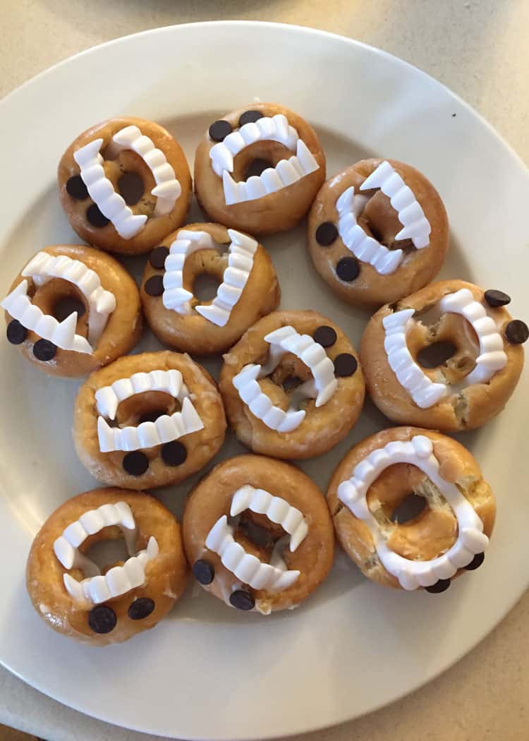 donuts with eyes and vampire teeth