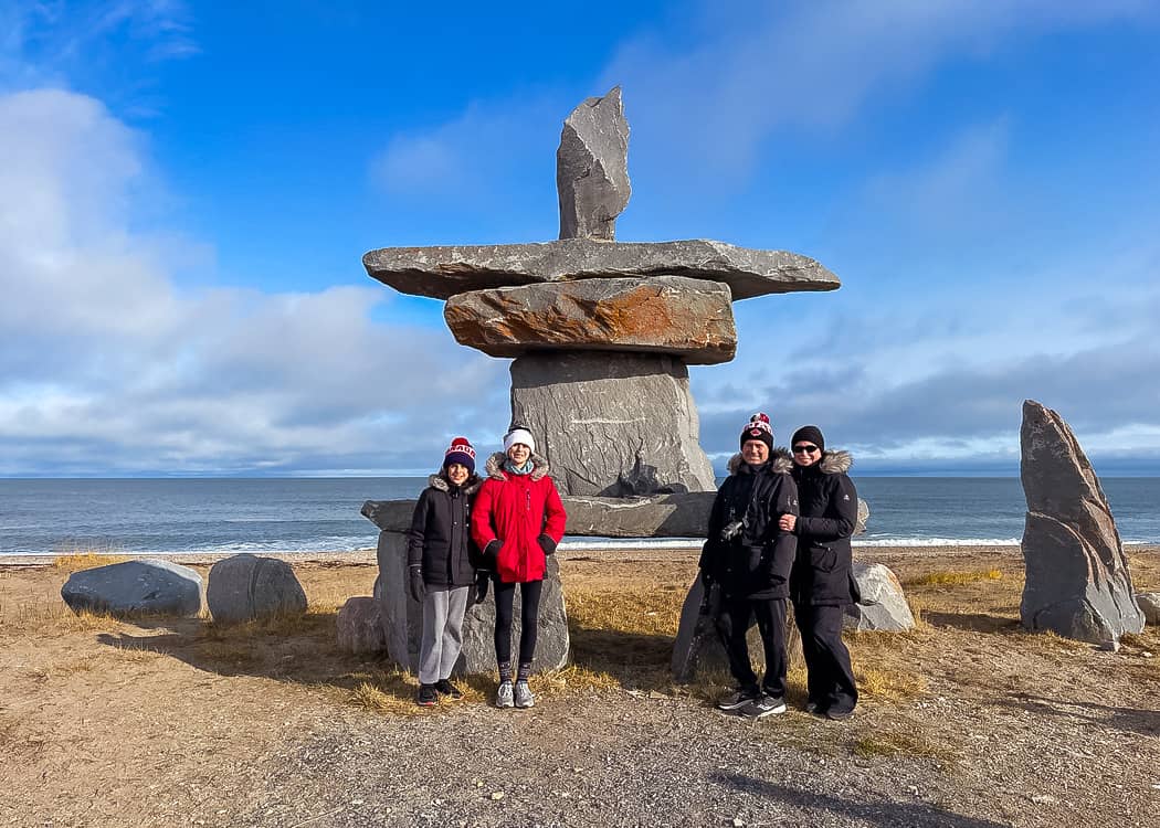 Churchill-Manitoba-family-with-Inuksuk